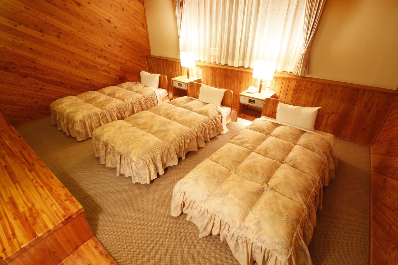 Log Hotel Larch Lake Kanayama Minamifurano Quarto foto