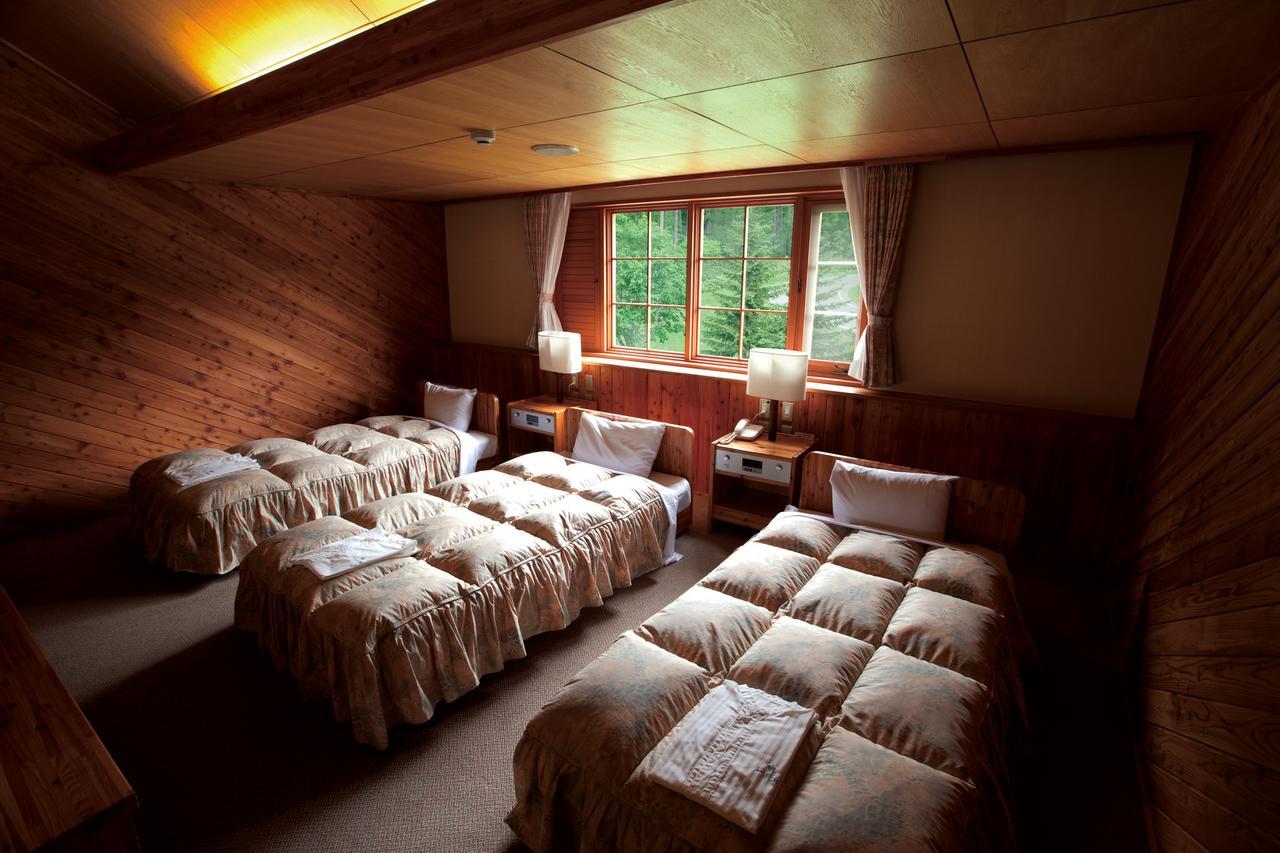 Log Hotel Larch Lake Kanayama Minamifurano Quarto foto