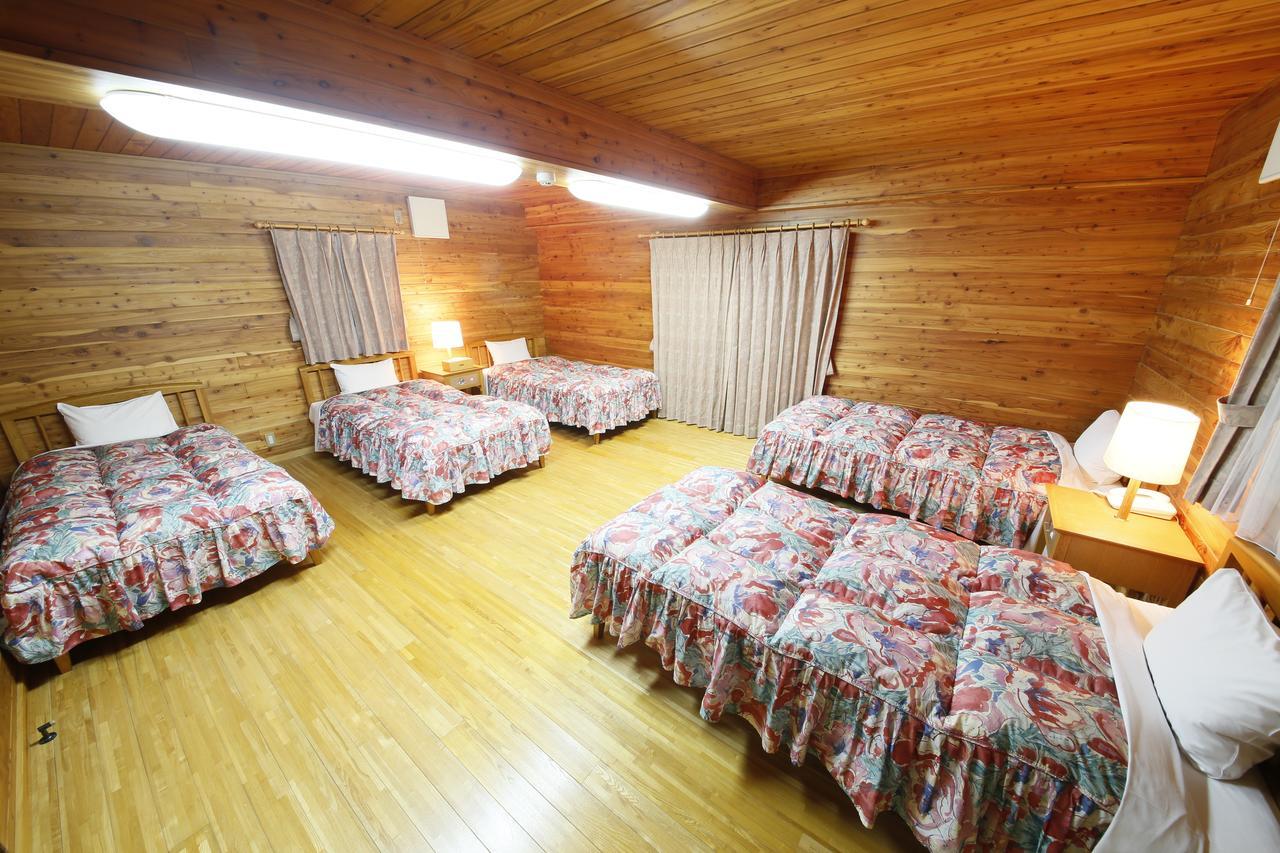 Log Hotel Larch Lake Kanayama Minamifurano Quarto foto