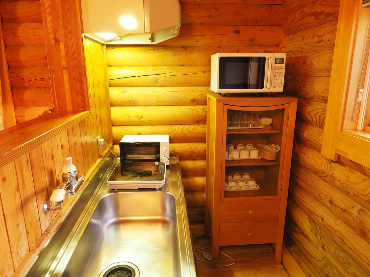 Log Hotel Larch Lake Kanayama Minamifurano Quarto foto