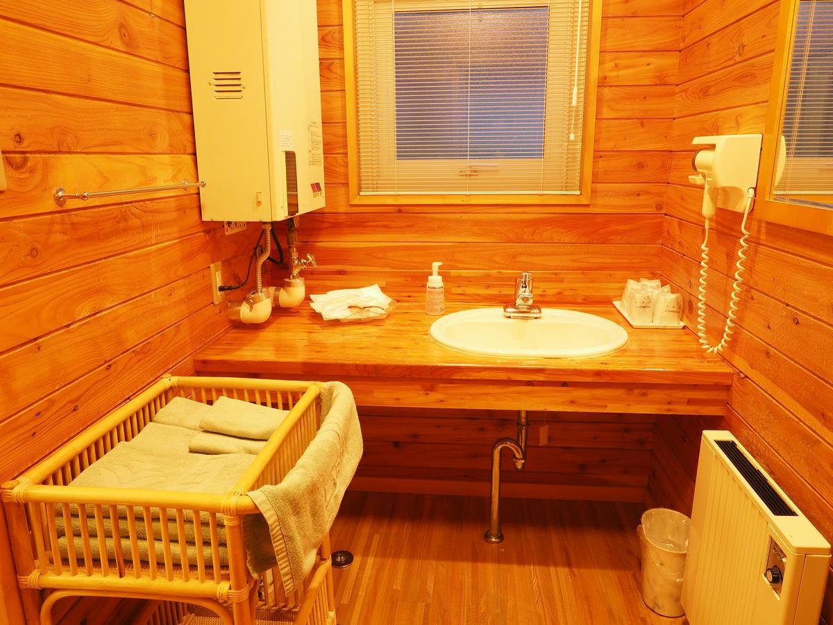 Log Hotel Larch Lake Kanayama Minamifurano Quarto foto